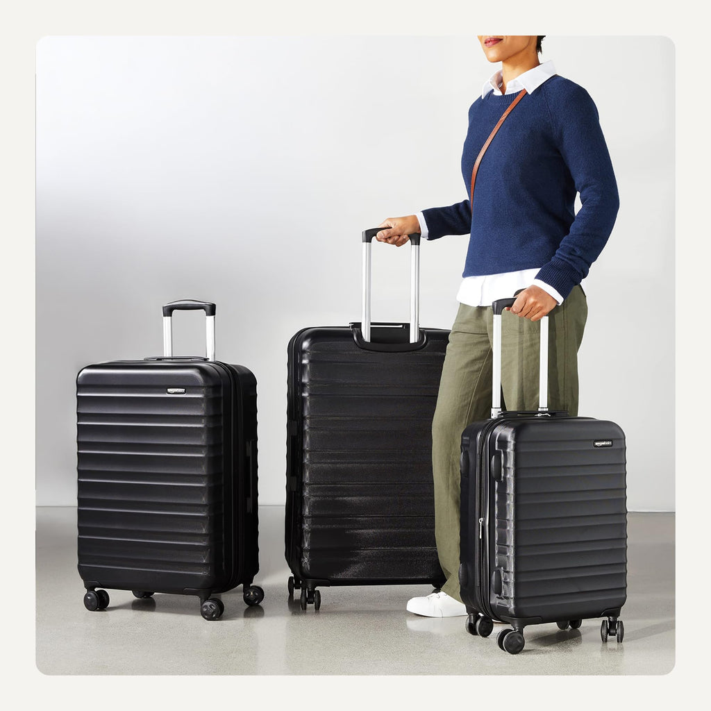 Amazon Basics 30" Hardside Large Checked Luggage, Hardshell Suitcase With Four Multi-directional Wheels, Expandable For Up to 15% More Space, Scratch-Resistant Shell, Black