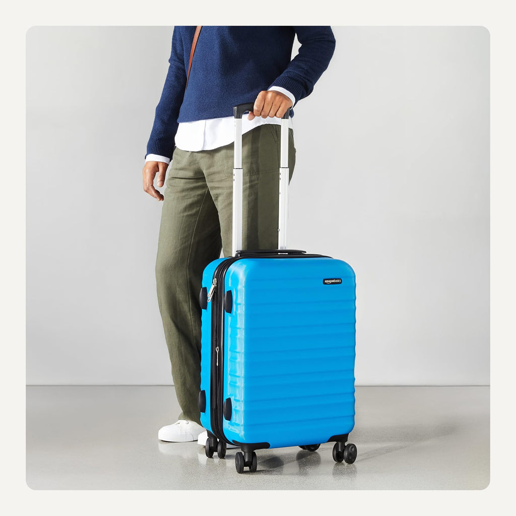 Amazon Basics 30" Hardside Large Checked Luggage, Hardshell Suitcase With Four Multi-directional Wheels, Expandable For Up to 15% More Space, Scratch-Resistant Shell, Black