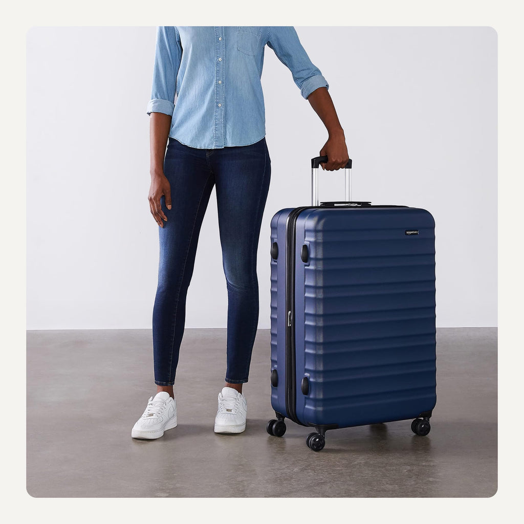 Amazon Basics 30" Hardside Large Checked Luggage, Hardshell Suitcase With Four Multi-directional Wheels, Expandable For Up to 15% More Space, Scratch-Resistant Shell, Black