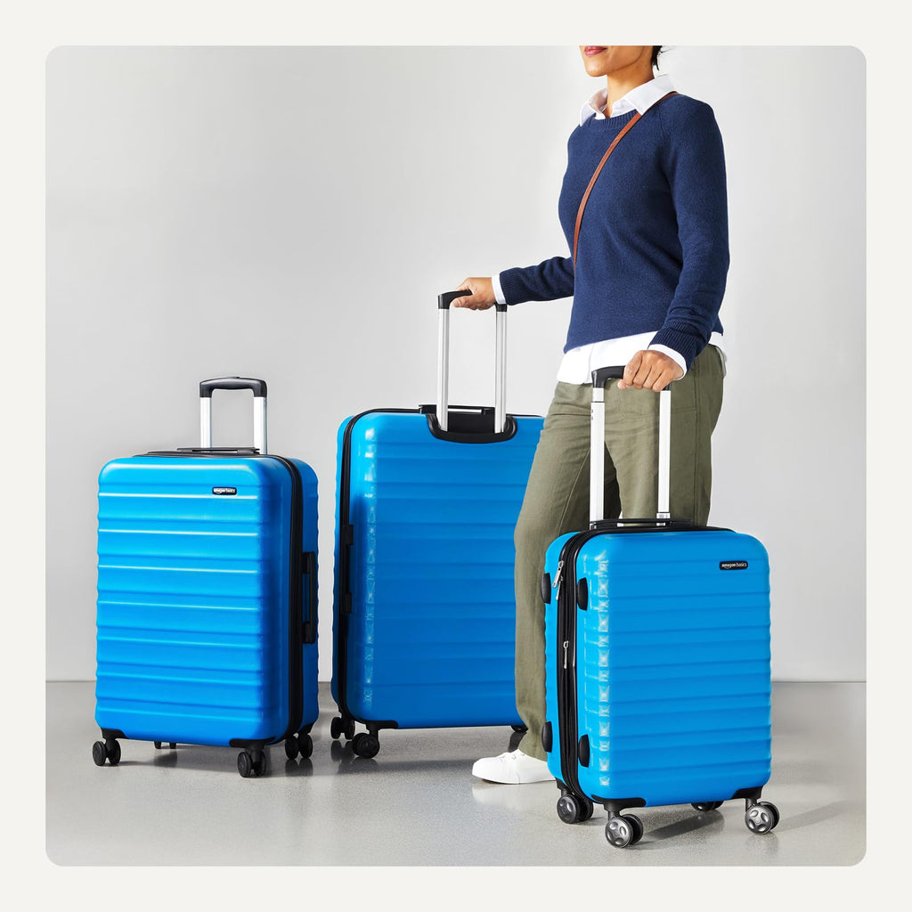 Amazon Basics 30" Hardside Large Checked Luggage, Hardshell Suitcase With Four Multi-directional Wheels, Expandable For Up to 15% More Space, Scratch-Resistant Shell, Black