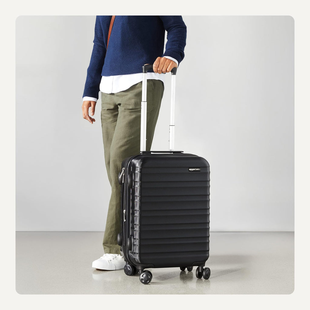 Amazon Basics 30" Hardside Large Checked Luggage, Hardshell Suitcase With Four Multi-directional Wheels, Expandable For Up to 15% More Space, Scratch-Resistant Shell, Black