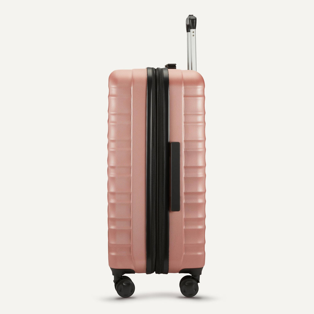 Amazon Basics 30" Hardside Large Checked Luggage, Hardshell Suitcase With Four Multi-directional Wheels, Expandable For Up to 15% More Space, Scratch-Resistant Shell, Black