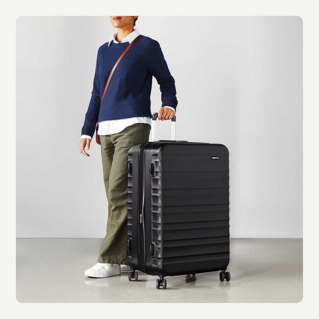 Amazon Basics 30" Hardside Large Checked Luggage, Hardshell Suitcase With Four Multi-directional Wheels, Expandable For Up to 15% More Space, Scratch-Resistant Shell, Black