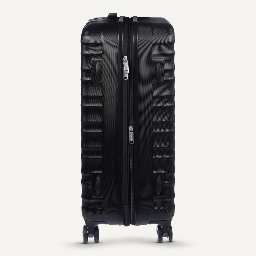 Amazon Basics 30" Hardside Large Checked Luggage, Hardshell Suitcase With Four Multi-directional Wheels, Expandable For Up to 15% More Space, Scratch-Resistant Shell, Black